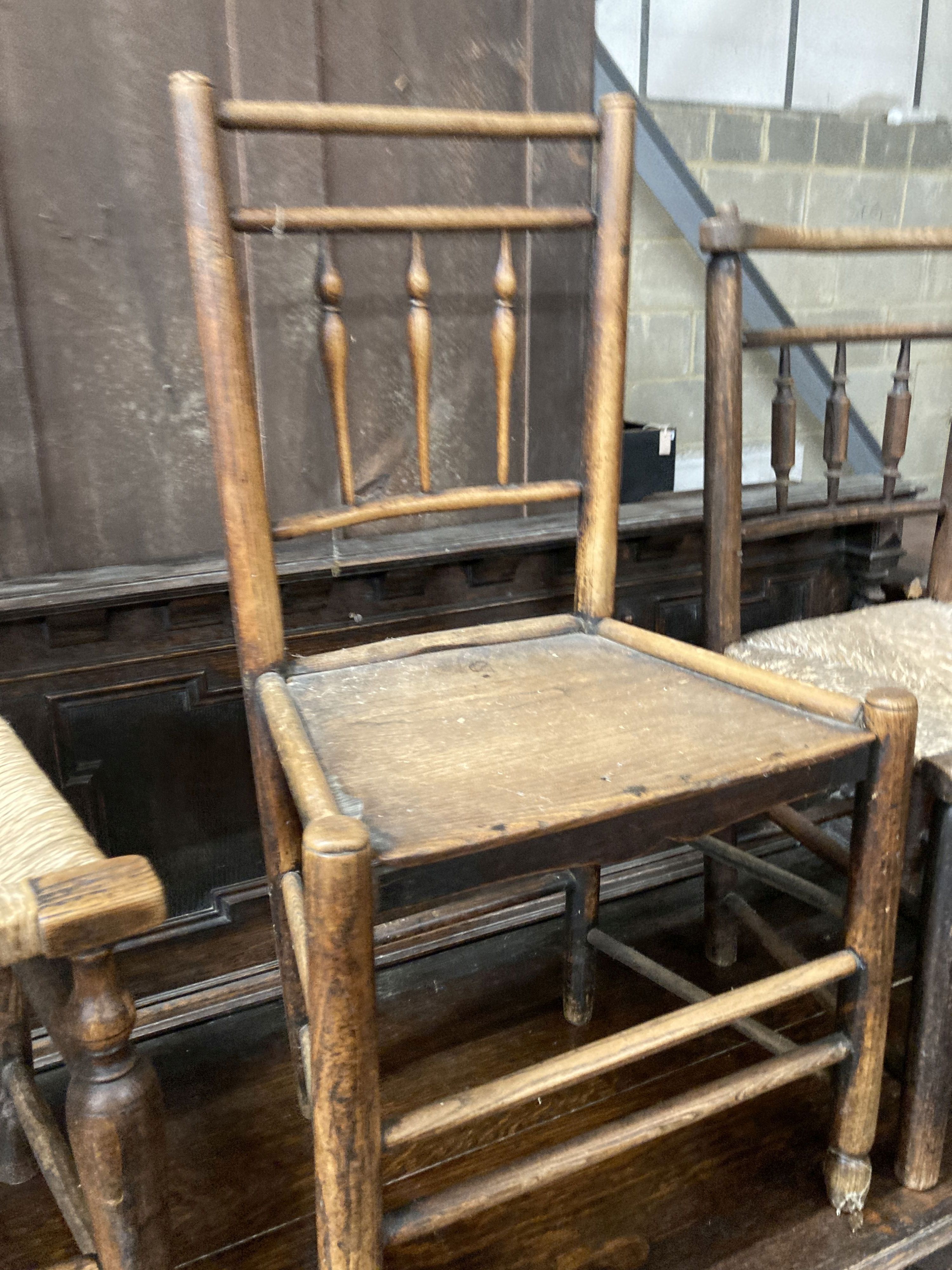 Three 19th century provincial rush and wood seat chairs